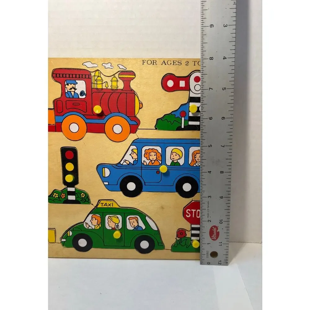 Vintage Children's Wooden Peg Puzzle Transportation Theme Train Taxi.